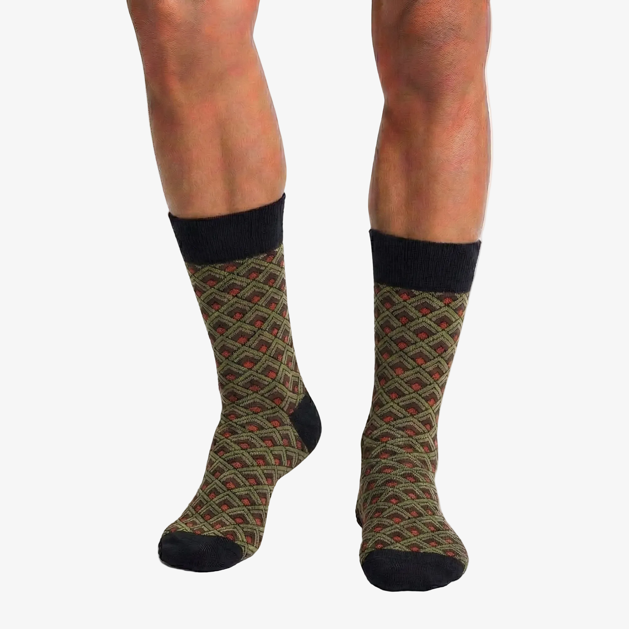 Patterned socks worn by a person on a white background
