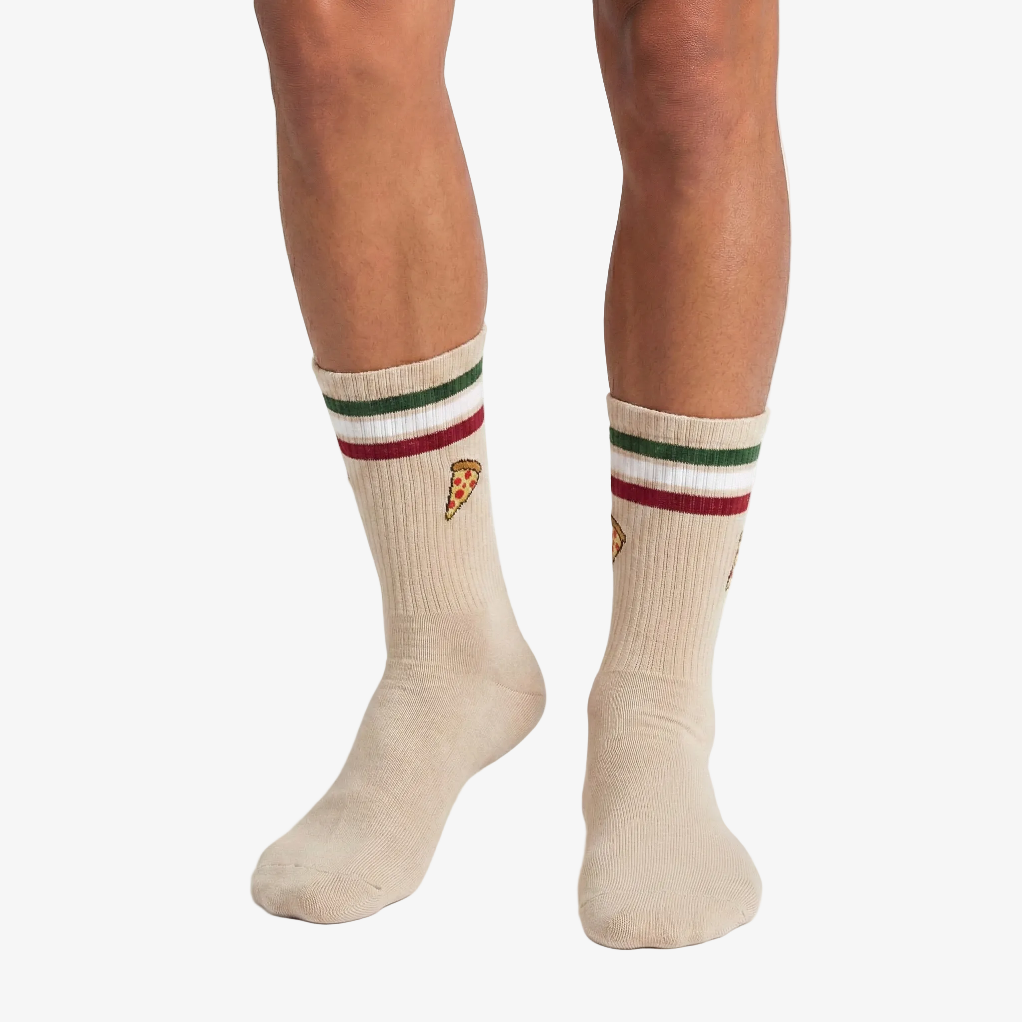 Beige socks with pizza design and red, green, and white stripes worn by a person on a white background